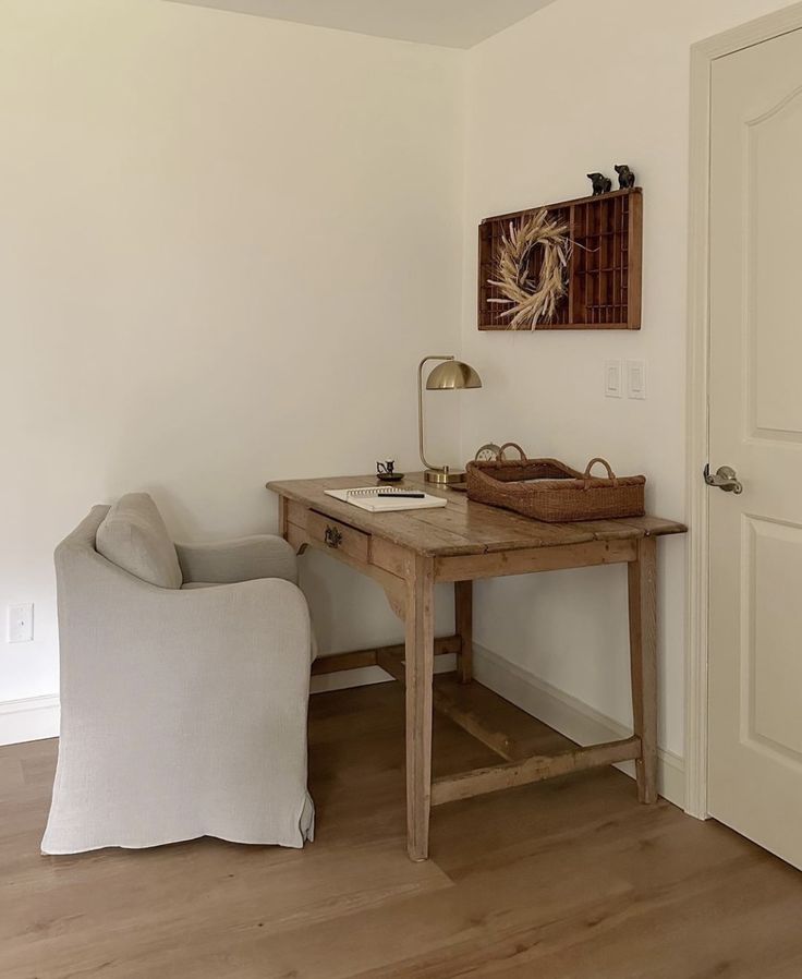 a living room with a chair and table in it