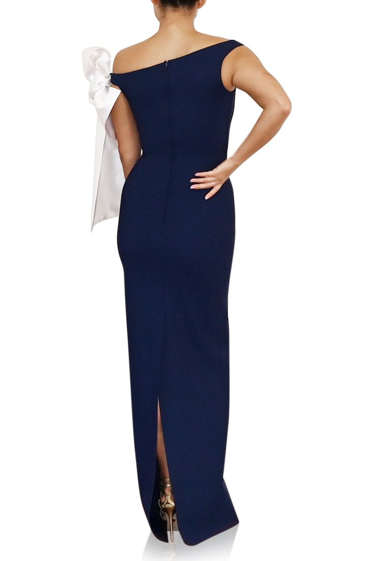 Greta Constantine Calandra Dress. This Navy, floor length, asymmetrical neckline gown with a playful knot in contrasting White. Pure elegance!Email info@wdrobeapparel.com for more information or different color options. True to size 68% Polyamide | 32% Elastane Made in Toronto | Fabric milled in Italy *Note that made-to-order pieces take 22 - 26 weeks to ship. Greta Constantine, Tie Up Shirt, Dramatic Sleeves, Perfect Cocktail Dress, Voile Dress, Blue Sequin Dress, Pure Elegance, Column Gown, Asymmetrical Neckline