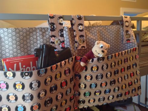 a teddy bear is sitting in a shopping bag