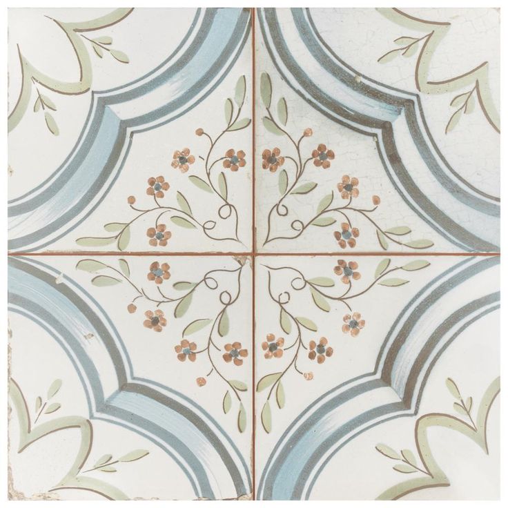 an artistic tile design with flowers and leaves