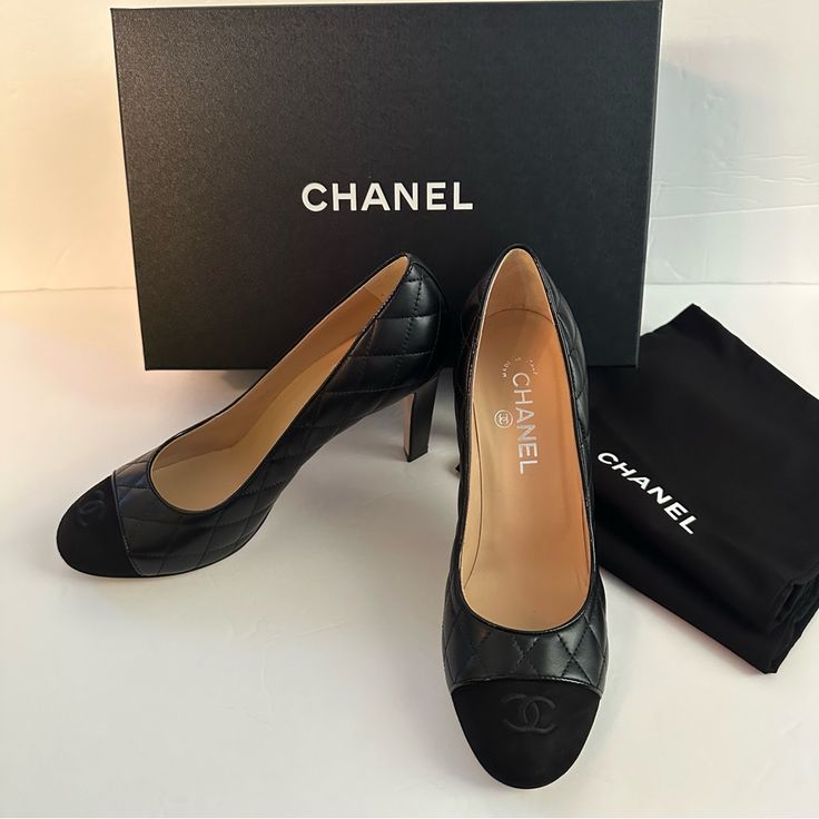 Nwt-Chanel Black Leather Quilted Pumps With Nappa/Kid Suede Cap Toe. 3 Inch Heel. Size 39.5 Comes In Box And Duster Bags! Worn Once, In Excellent Condition. Black Cap Toe Office Heels, Black Cap Toe Heels For Formal Occasions, Designer Leather Court Shoes With Round Toe, High-end Leather Heels With Round Toe, Designer Black Court Shoes With Leather Sole, Designer Black Leather Court Shoes, Black Luxury Calf Leather Court Shoes, High-end Black Heels With Round Toe, Luxury Leather Cap Toe Heels