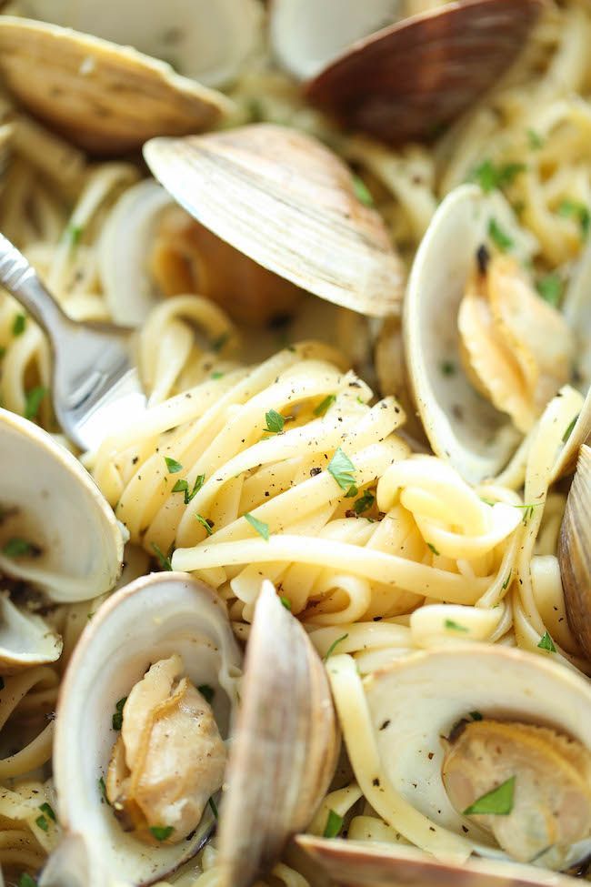 pasta with clams and sauce in a pan