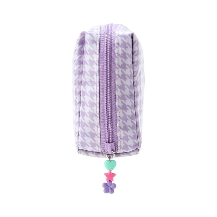 a purple and white checkered bag with a small toy hanging from it's side