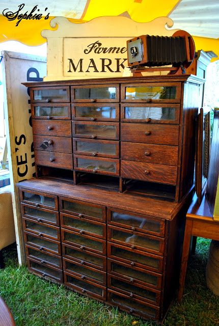 an old dresser is sitting in the grass