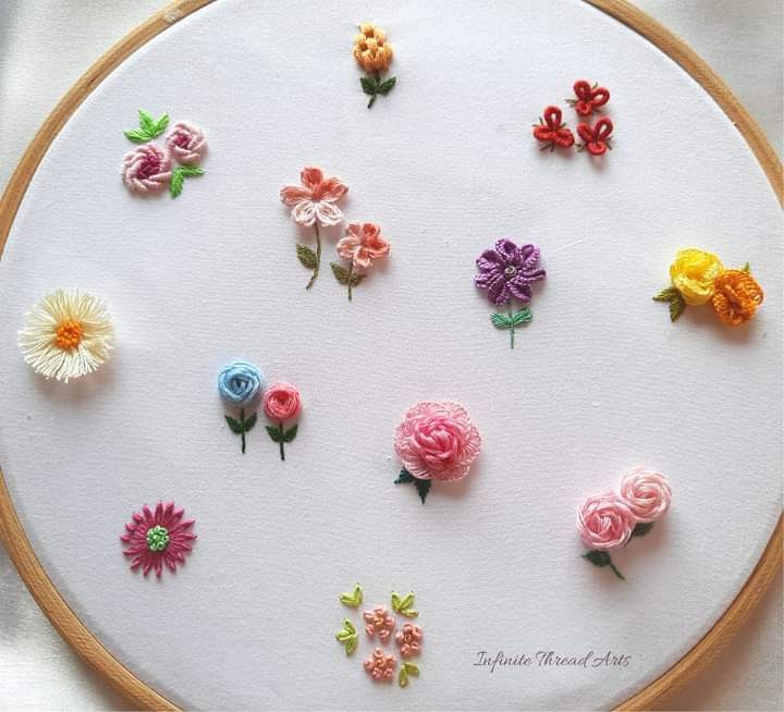 there are many different flowers on the embroidery