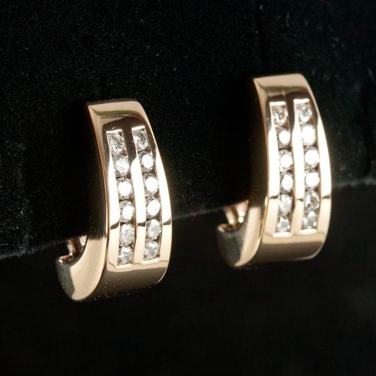 14k Yellow Gold Round Diamond Huggie Style Earrings W/ Omega Backs .72ctw Metal Information: 14k Yellow Gold Total Weight: 7.0g Width: 7 MM Length: 17 MM Stone Information Main StoneGem Type: Diamond Shape: Round (2.0mm) Color: H Clarity/Quality: SI2 Carat Weight: 0.03ct Number of Stones: 24 Total estimated ctw (carat total weight): 0.72ctw Estimated Retail Price: $1995.00 OUR PRICE: $1598.00 43684 Formal Fine Jewelry Diamond Earrings Channel Set, Formal Huggie Earrings Channel Set, Formal Channel Set Diamond Earrings, Fine Jewelry 14k Gold Channel Set Diamond Earrings, 14k Gold Channel Set Earrings For Anniversary, 14k Gold Channel Set Diamond Earrings, Formal 14k Gold Diamond Earrings Channel Set, Formal 14k Gold Channel Set Diamond Earrings, Formal Channel Set Huggie Earrings