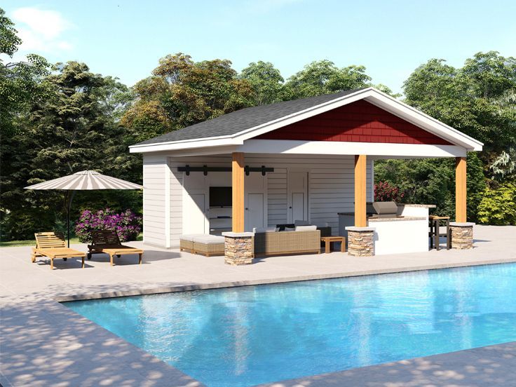 a small pool house next to a swimming pool with an outdoor kitchen and dining area