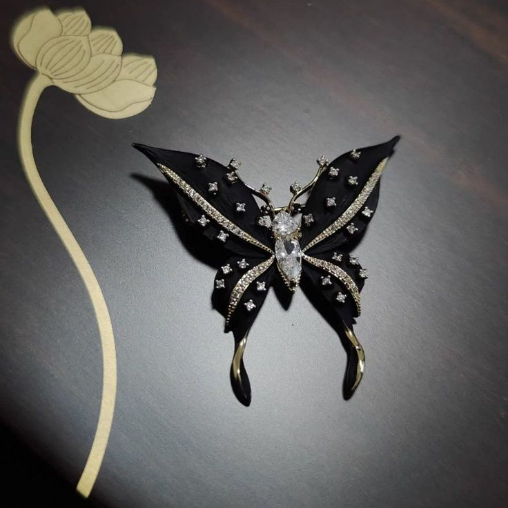 Transform Any Of Your Outfit Into A Complete Masterpiece With This Versatile Butterfly Brooch. Handcrafted Sophisticated And Delicate Finish Amazingly Detailed With Rhinestones Secured Stainless Steel Pin-Back Dimensions: 4.6 X 4.6cm Can Be Used To Dress Up A Casual Attire Or Accentuating A Formal Dress. *Notes: These Brooches Are Not Intended To Be Used As Load-Bearing Fastenings. #1286a Black Brooch Pins For Evening, Elegant Butterfly Shaped Pins, Butterfly Shaped Brooches For Party, Black Brooch Pins For Party, Black Party Brooch Pins, Elegant Butterfly Brooches For Evening, Chic Black Brooches For Parties, Chic Black Party Brooches, Chic Black Brooch As A Gift