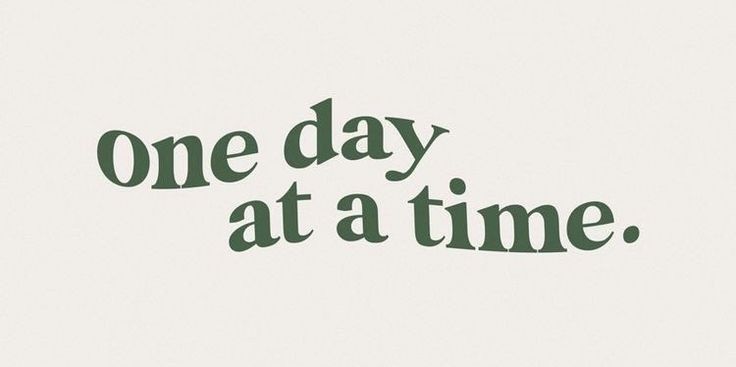 one day at a time written in green ink on white paper with the words'one day at a time '