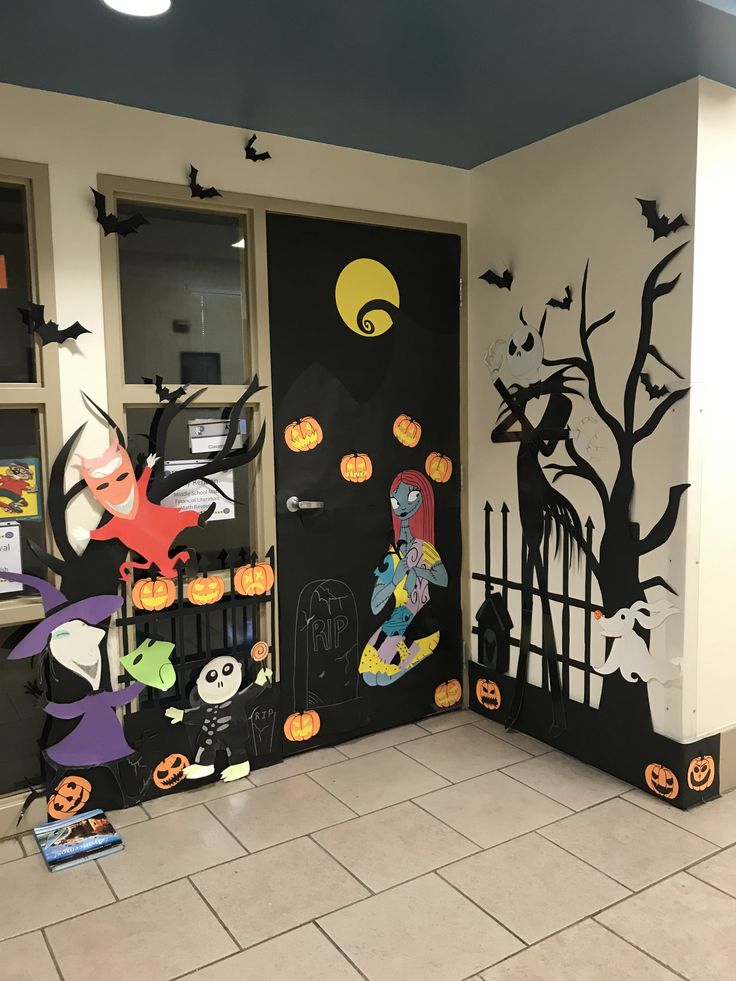 the front door is decorated with halloween decorations