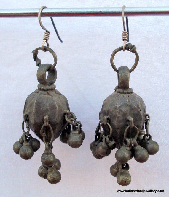 VINTAGE ANTIQUE TRIBAL OLD SILVER EARRING PAIR FROM RAJASTHAN INIDA,USED BY TRIBAL PEOPLE OF RAJASTHAN. GREAT DESIGN ADORN WITH SILVER BELLS, GOOD FOR TRIBAL STYLE BELLY DANCE, OR EVERY DAY WEAR.Long with wire - 6 cm(2.36")width max. - 1.5 cm(0.59")Weight - 23.5 gramsMaterial - silver and original old worn pair. Silver Jewellery Photography, Traditional Jewelry Indian, Jewelry Background, Gift Costume, Jewellery Photography, Traditional Indian Jewellery, Jewelry Editorial, Jewelry Minimalist, Silver Bells