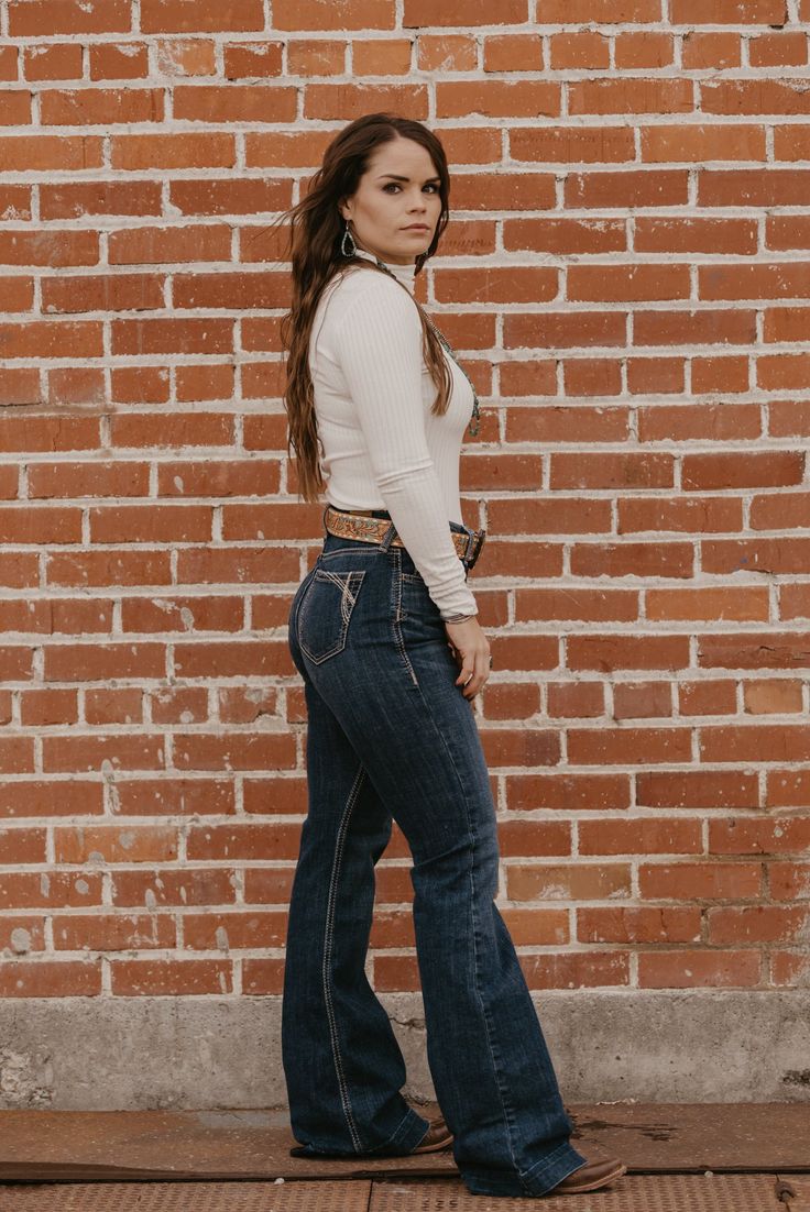 If you're looking for a performance jean with a more streamlined look, this high-rise trouser is a little more fitted through the thigh and knee. The dark wash and subtle stitching go anywhere, with everything. Waistband that won't gap and a seat that won't sag. Slim Through Hip & Thigh | High-Rise | Trouser Style Bottom Material: 95% Cotton | 4% Polyester | 1% Spandex R - Regular - 33" L - Long - 35" XL - Extra Long - 37" 9.75oz performance denim Runs True to Size - High Rise Mock Neck Top, Trouser Style, Thigh Highs, Online Purchase, Mock Neck, Gap, Long Sleeve Tops, High Rise, Stitching