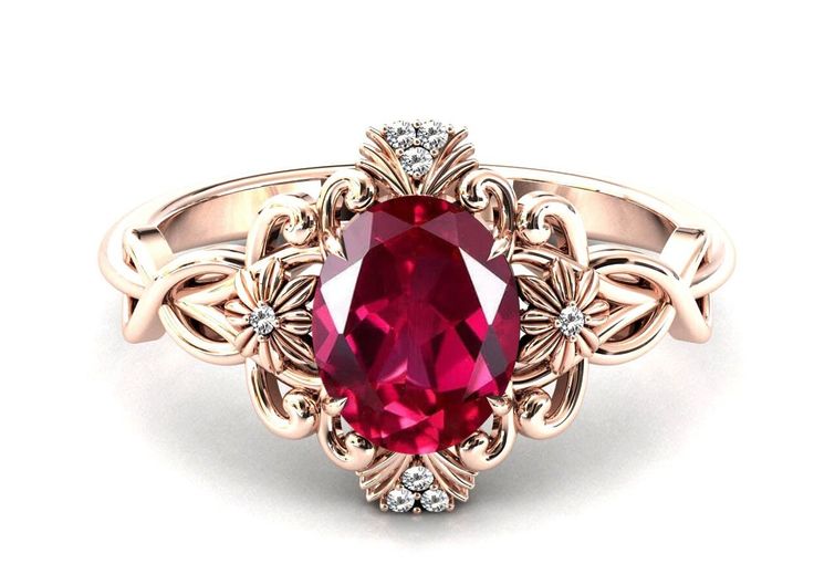 a pink tourmaline and diamond ring on a white background