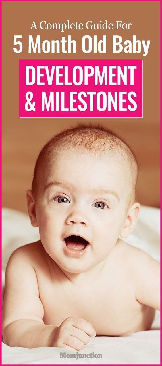 a baby laying on top of a bed with the words 5 month old baby development and milestone