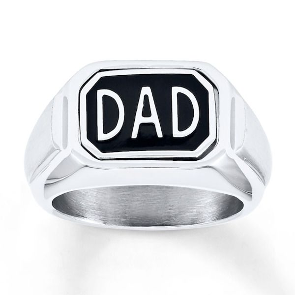 Pay tribute to him with this Dad ring crafted of stainless steel. The word "Dad" shines on a background of black stainless steel for bold contrast. The center of the ring flips over to give Dad two looks in one! Personalized Black Stainless Steel Rings, Father's Day Black Engraved Jewelry, Black Stainless Steel Signet Promise Ring, Adjustable Black Engraved Ring, Black Stainless Steel Engraved Ring, Modern Black Engraved Rings, Black Stainless Steel Engraved Ring For Gift, Black Stainless Steel Engraved Ring As Gift, Personalized Black Engraved Ring For Anniversary