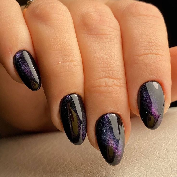 Are you looking for something that will spice up your look? Check these beautiful galaxy nail designs! The Milky Way, planetary haze, stellar gases, and cosmic dust designs will catch everybody's eyes on you for sure. #glaminati #galaxynails #galaxynailsdesign #cosmosnails #spacenails #purplenails #constellationsnails #milkywaynails #planetnails Galaxy Nail, Planet Nails, Galaxy Nail Art, Space Nails, Eye Nails, Stylish Nails Designs, Galaxy Nails, Cat Eye Nails, Dark Nails