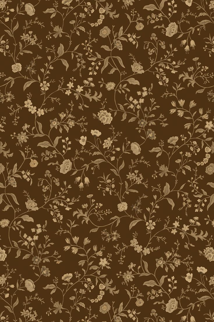 a brown background with flowers and leaves