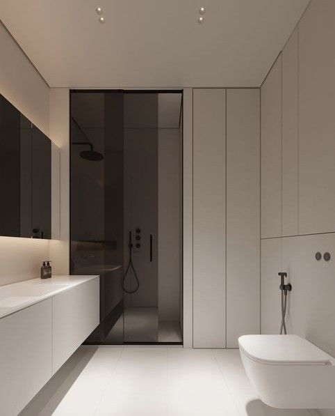 a modern bathroom with white walls and flooring