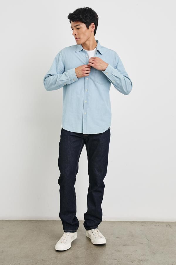 Look and feel amazing in this super soft, vintage inspired denim chambray shirt. Made from lightweight cotton chambray, this long sleeve collared button-down shirt features a vintage wash finish, classic fit, and patch pocket at chest.True to size100% CottonMachine Wash Cold. Tumble Dry Low. Remove Promptly. Do Not Bleach. Washed Blue Button-up Shirt For Casual Gatherings, Everyday Dark Wash Cotton Shirt, Casual Indigo Shirt With Patch Pockets, Unstructured Denim Button-up Shirt, Classic Dark Wash Shirt With Patch Pockets, Washed Blue Button-up Shirt With Patch Pockets, Dark Wash Long Sleeve Shirt, Dark Wash Unstructured Long Sleeve Shirt, Light Indigo Denim Shirt For Everyday