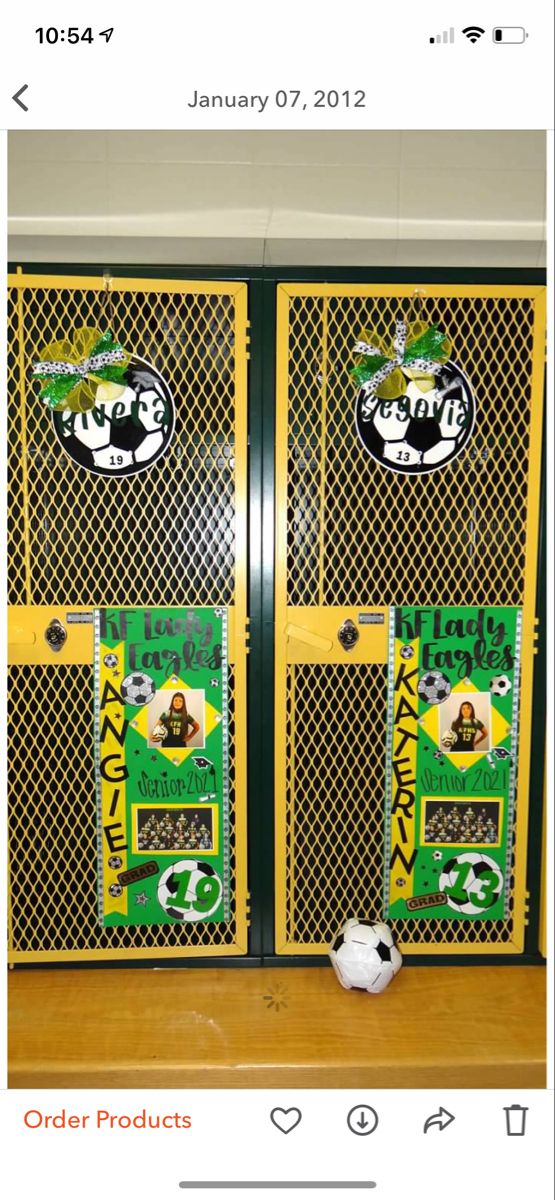 two yellow and black lockers with stickers on them are sitting in front of each other