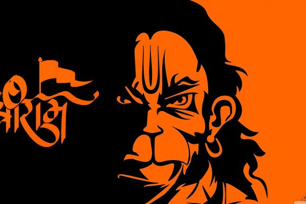 an orange and black poster with the face of ganesh