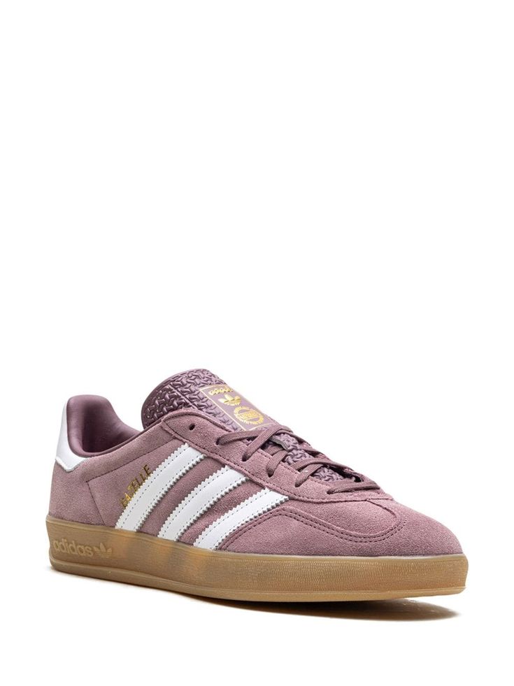 "Find ADIDAS Gazelle Indoor \"\"shadow Fig\"\" Sneakers on Editorialist. rose pink suede logo stamp at side signature 3-Stripes logo contrasting heel counter round toe front lace-up fastening logo-print tongue branded insole gum-rubber sole These styles are supplied by a premium and authenticated sneaker marketplace. Stocking only the most sought-after footwear, they source and curate some of the most hard to find sneakers from around the world." Adidas Suede Lace-up Sneakers, Adidas Lace-up Suede Sneakers, Adidas Suede Low-top Skate Shoes, Adidas Logo Low-top Suede Sneakers, Low-top Suede Adidas Sneakers, Adidas Suede Sneakers With Round Toe, Adidas Suede Sneakers With Logo, Pink Suede Sneakers With Gum Sole, Pink Suede Low-top Sneakers