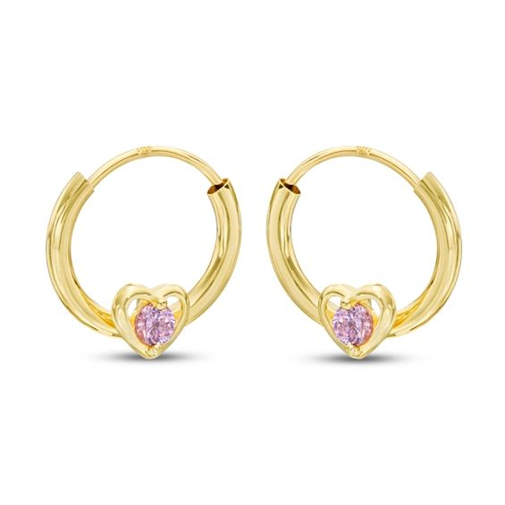 These cute children's hoop earrings feature an endless design and a small heart at the base of each. A round-cut pink cubic zirconia sits at the center of each heart to complete the pretty design. The earrings are fashioned in beautiful 14K yellow gold. Cubic Zirconia Hoop Earrings, Jewelry Lookbook, Pretty Design, Small Heart, Accessories Jewelry Earrings, Pink Stone, The Pretty, Earring Backs, Cute Jewelry