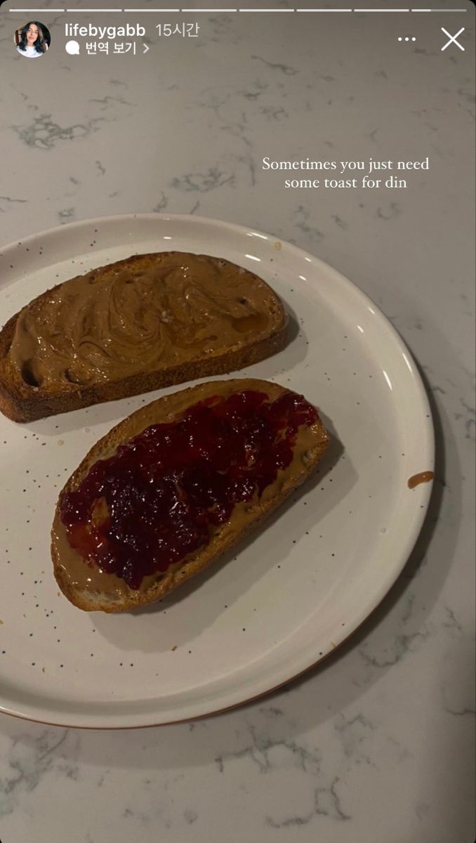 peanut butter and jelly toast on a white plate