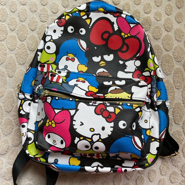 Condition: Brand New! Hello Kitty & Friends Mini Backpack!! Item Details: As Seen In Pictures Listed Used Or Unused: New Size: Small/Mini Backpack Disclaimers: None!! Can Provide Measurements (If Needed) Act Now!! Great Deals!! Offers Welcomed!! I Paid Full Price, So You Dont Have To!! #Covidfreehome #Smokefreehome #Petfreehome Feel Free To Ask Me Any Questions Down Below! Black Kawaii Backpack For Everyday Use, Cute Hello Kitty Print Backpack For Daily Use, Trendy Hello Kitty Print Bag For Back To School, Trendy Hello Kitty Print Back To School Bag, Trendy Hello Kitty School Bag, Playful Hello Kitty Print Standard Backpack, Multicolor Harajuku Standard Backpack, Cute Hello Kitty Backpack For Daily Use, Cute Hello Kitty Print Backpack For Travel