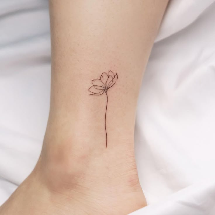 Fine Line Tattoo Minimalist Flower, Lotus Dainty Tattoo, Small Flower Bud Tattoo, Lotus Flower Stem Tattoo, Single Needle Tattoo Flower, Fine Line Flower Tattoo With Stem Writing, Lotus Stem Tattoo, 6 Petal Flower Tattoo, One Stem Flower Tattoo