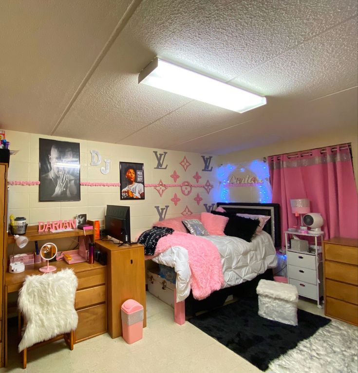 a bedroom decorated in pink, white and black