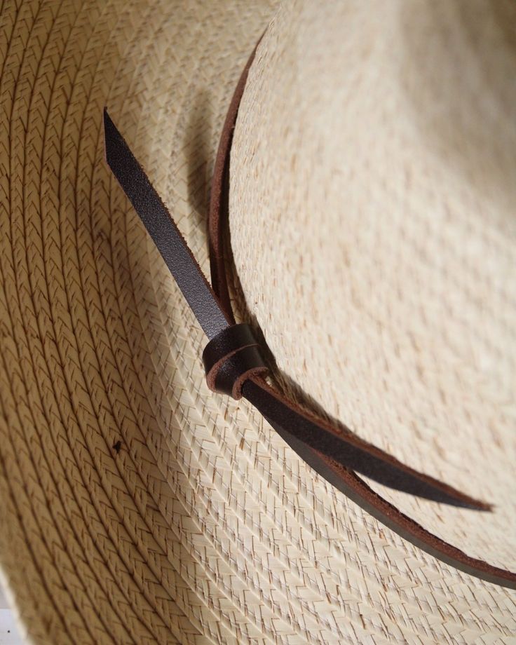 This adjustable hat band cinches down to fit most hats, and easily tightens by simply pulling each end of leather. The slim strips of leather add a nice accessory to any hat and it is easily interchangeable with other bands. Made with premium chap leather sourced from US tanneries Adjustable knot closure fits up to 7 5/8 hat size After pulling the band snug to fit your hat, remove the band and trim excess leather with scissors or box cutter to your desired length We recommend periodically re-tig Fishing Photography, Spur Straps, Stubby Holder, Adjustable Knot, Belt Jewelry, Wrap Belt, Hat Band, Leather Care, Adjustable Hat