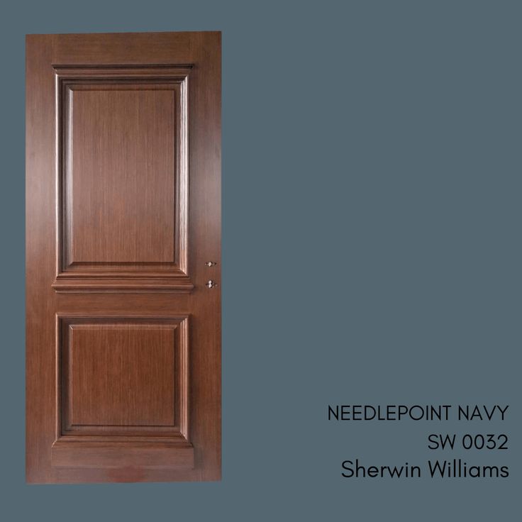 the front door is made of wood and has a blue background with text that reads needlepoint navy