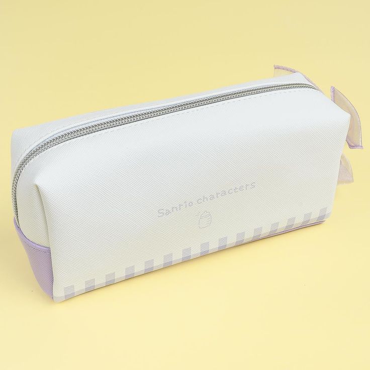 This kawaii pencil case features cute watercolor-like prints of Sanrio Characters dressed as babies! It even showcases a sheer ribbon zipper pull for added cuteness. Use this case to store your writing materials. Made from synthetic leather White Stationery Pouch With Pen Slots, Kawaii Rectangular Pencil Case With Zipper Closure, White Portable Pencil Cosmetic Bag, White Pouch Stationery For School, School Stationery Pouch In White, White Stationery With Pen Slots For Everyday Use, White Stationery With Pen Slots, Portable White Pencil Case Pouch, White Zipper Pouch Cosmetic Bag For School