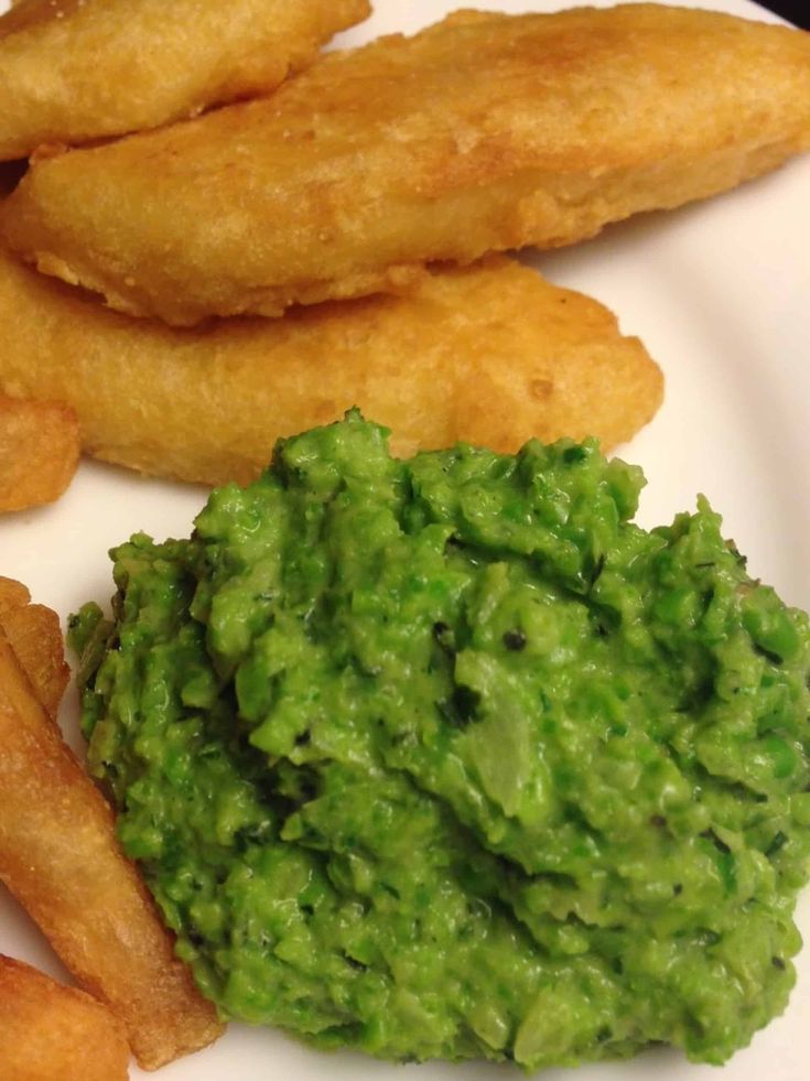 some fried food is on a white plate