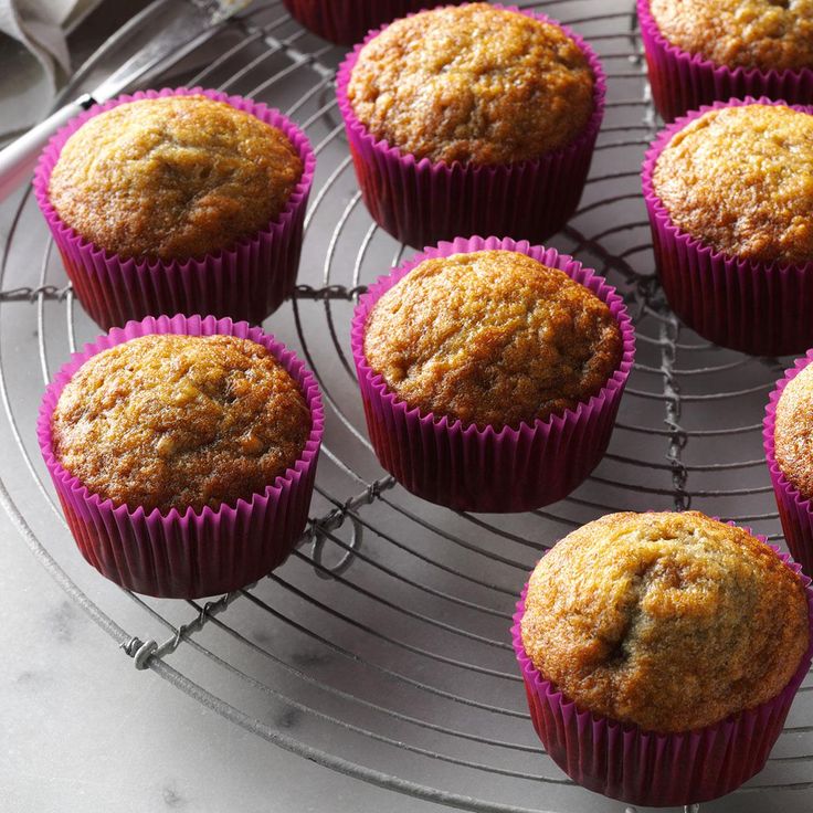 several muffins cooling on a wire rack