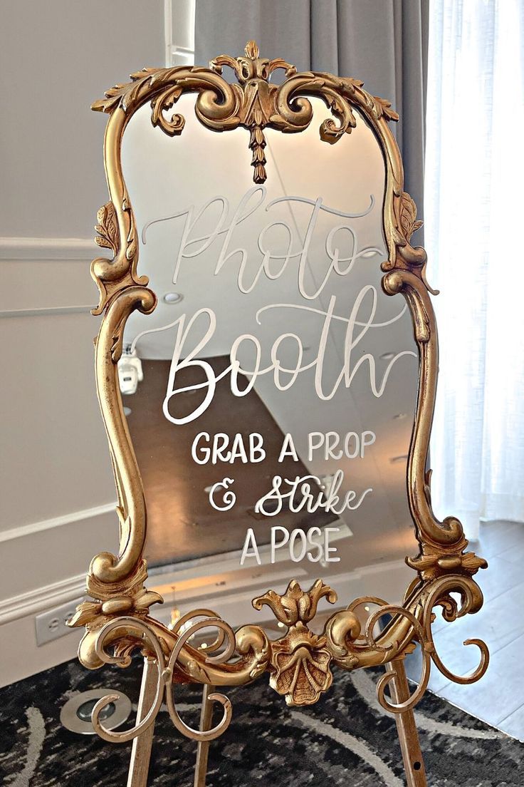 Shop this antique gold wedding mirror sign for your wedding reception. The perfect wedding decor to let your guests know about your fun photo booth. Add a special touch to your event with this beautiful custom sign! Black White Gold Wedding Theme, Wedding Photobooth Sign, Wedding Mirror Sign, Mirror Wedding Signs, Mirror Photo Booth, Photo Booth Backdrop Wedding, Enchanted Garden Wedding, Wedding Mirror, Photo Booth Sign