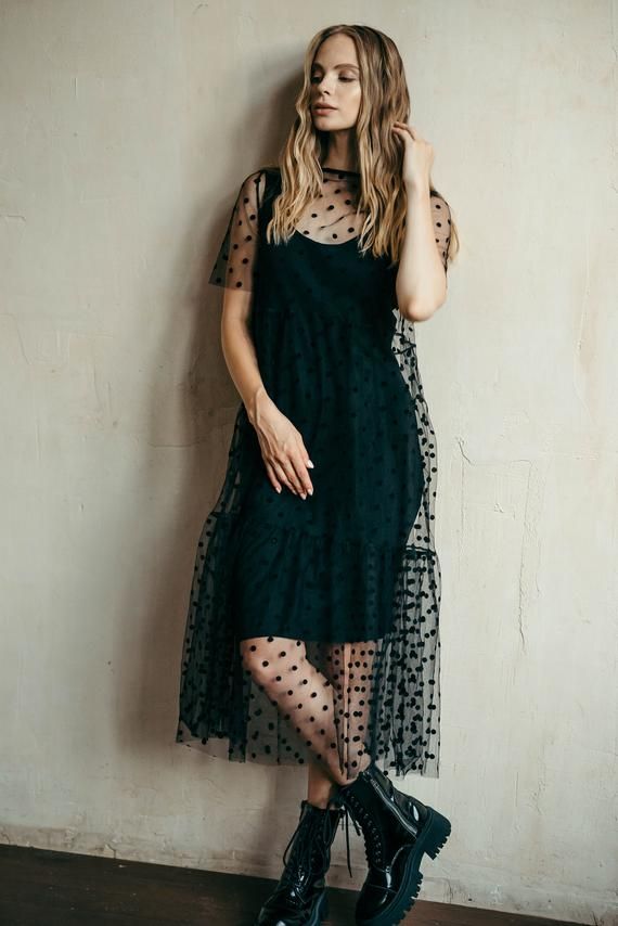 We have waited to go out-out for way too long and now we cannot wait to rock this sheer dress at the parties and festivals! Made from lightweight see-through silky tulle / mesh / bridal net fabric, these polka dot boho dresses are now available in black and off-white colour ways. This simple tiered skater dress design will transform your outfit. Whether paired with heels or biker boots, jeans or dresses, this tulle midi dress will become a focal point of your look.These see-through dresses were Sheer Dress With Jeans, Sheer Dress Over Shorts, Dresses With Net Fabric, Black Netted Dress, Non Girly Dresses, Black Net One Piece Dress, Outfit Statement Piece, Mesh Star Dress, Sheer Dress Pattern