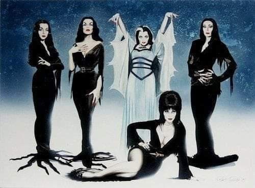 the witches are posing for a photo in front of a blue background with black and white graphics