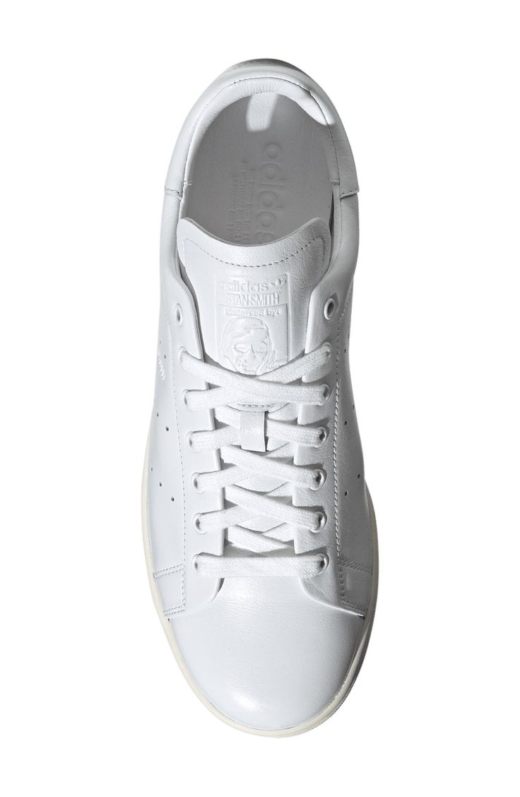 Sleek and smart, this sneaker named for tennis legend Stan Smith features premium leather inside and out plus foil-stamped details for elevated polish. Pops of color and a grippy rubber tread keep the heritage spirit alive and scoring. Lace-up style Removable insole Leather upper and lining/rubber sole Imported Tennis Legends, Dress Code, White White, Dress Codes, Up Styles, Cortes De Pelo, Adidas Originals, Rubber Sole, Men's Fashion