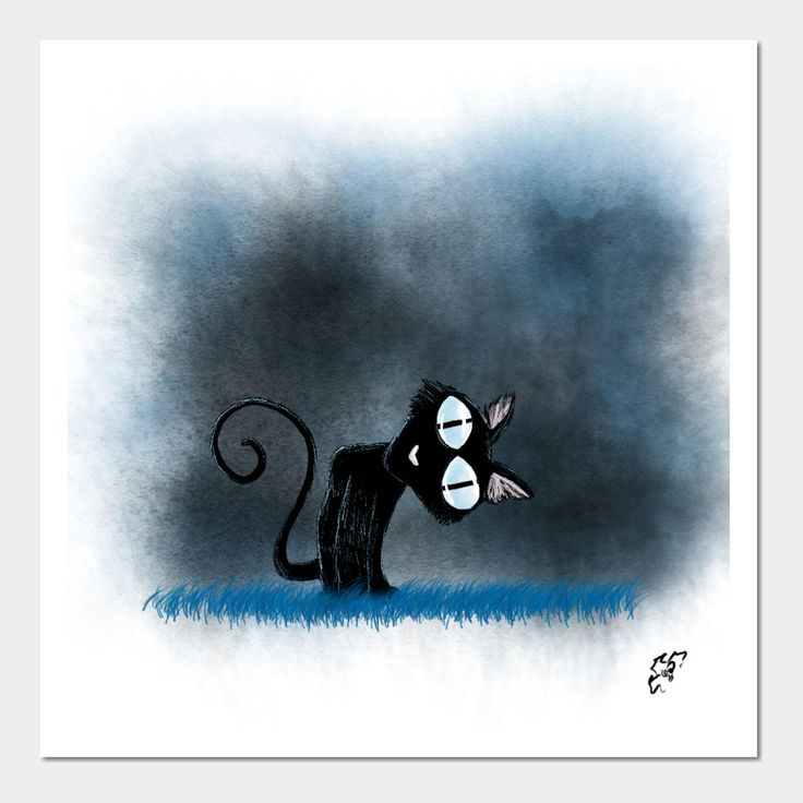 a black monkey with big eyes standing in the grass