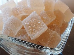 some sugar cubes are in a glass bowl