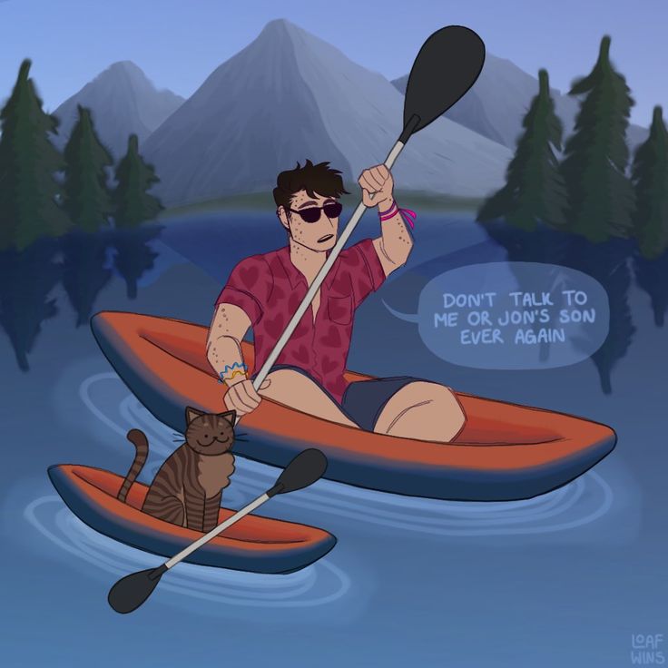 a man in a kayak with a cat on his lap