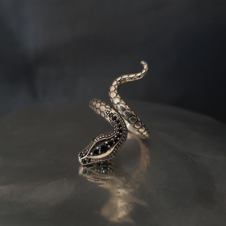 Oriental Snake Ring, 925k Sterling Silver Witchy Ring, Hecate's Snake Ring, Adjustable Snake Goddess Ring, Serpent Ring, Women's Gothic Ring Hecate's Sacred Animal, Snakes ◑ Hecate was the goddess of magic, witchcraft, the night, moon, ghosts and necromancy. She was the only child of the Titanes Perses and Asteria from whom she received her power over heaven, earth, and sea. "Hecate's themes are the moon, beginnings and magic. Her symbols are serpents, horses or dogs ,which are her sacred animal Fine Jewelry Silver Snake-shaped Ring, Silver Snake Shape Fine Jewelry Ring, Fine Jewelry Silver Snake Shape Ring, Adjustable Silver Snake Ring Fine Jewelry, White Gold Snake Ring With Polished Finish, Fine Silver Snake Ring, Sterling Silver Snake-shaped Rings, Adjustable Silver Snake-shaped Ring, Adjustable Engraved Snake Ring