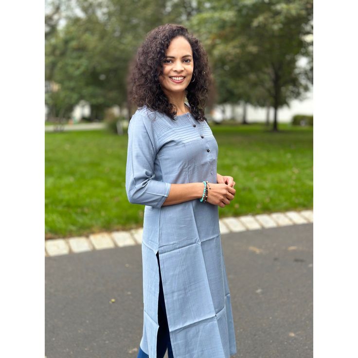 This grey kurta for women features rayon fabric for a comfortable and soft feel. The 3/4th sleeves and front button design make it a simple yet stylish choice for any occasion. An industry expert pick for easy and elegant dressing. A classic wardrobe staple this Kurta features a flattering a-line silhouette, designed to provide a comfortable fit. The figure-flattering design makes this kurta ideal for any occasion. Note : Please size up as Kurta fits snug. Fit: Regular Fit Fabric: Rayon Neck: Ro Casual Cotton Kurta With Half Sleeves, Casual Straight Kurta For Work, Casual Spring Workwear Kurta, Kurta Fits, Grey Kurta, Elegant Dressing, Kurta For Women, Classic Wardrobe Staples, Classic Wardrobe