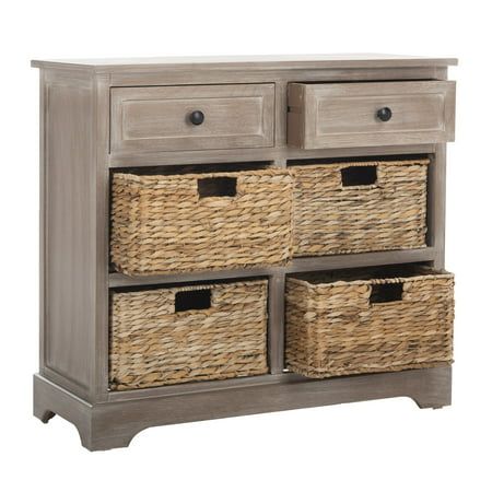 an old dresser with wicker baskets on top