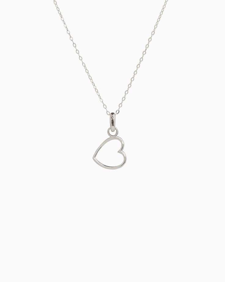 The Heart Charm is handcrafted in sterling silver and is a sweet piece to add to your collection. Let this charm serve as a reminder of your love for the islands or for someone special in your life. Pair with your favorite hook bracelet or dainty chain, sold separately. Metal: Sterling silver Dimensions: 15mm x 10mm Style #: C202 Heart-shaped Sterling Silver Charm Necklace, Adjustable Heart-shaped Sterling Silver Charm Necklace, Silver Heart-shaped Engraved Charm Necklace, Silver Heart-shaped Sterling Silver Charms, Heart-shaped Sterling Silver Charms For Valentine's Day, Hook Bracelet, Heart Charm, Let It Be, Chain