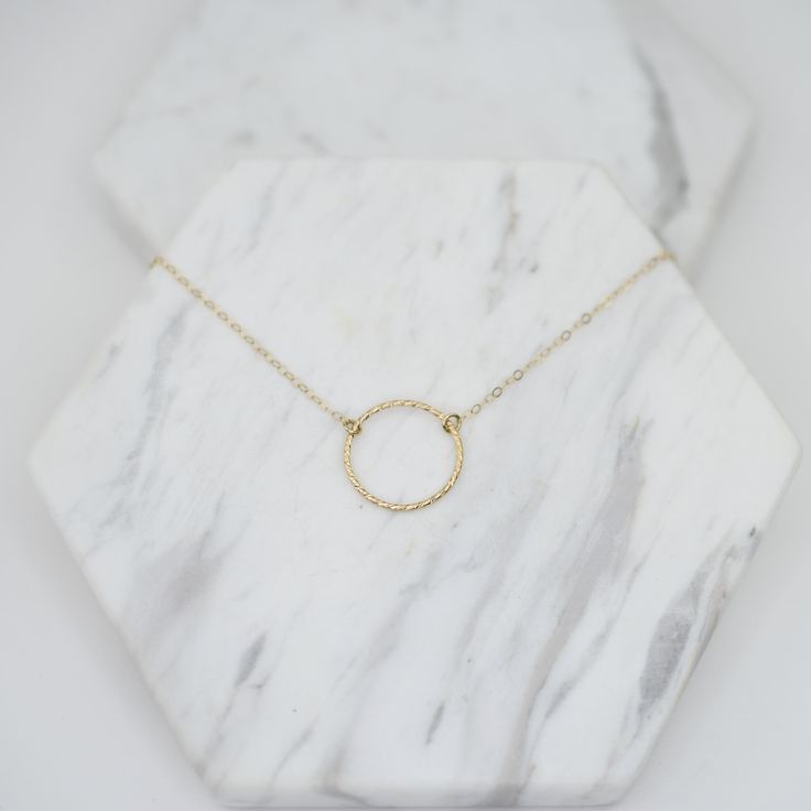 "This lovely 14K gold delicate circle necklace set is a lovely expression of affection and a symbol of a mother and daughter's friendship and love. The necklaces will be shipped in a beautiful gift box. Mother necklace: The circle charm is 14K yellow gold, it is 13/16\" The necklace is 14K yellow gold. Please choose 1.5mm flat cable chain (delicate ) Daughter necklace: The circle charm is 14K yellow gold, it is 11/16\" The necklace is 14K yellow gold. Please choose 1.5mm flat cable chain (delica Elegant Hammered Open Circle Jewelry, Elegant Hammered Circle Necklace, Elegant Circle Hammered Necklaces, Elegant Full Circle Hammered Jewelry, Elegant 14k Gold Full Circle Necklace, 14k Yellow Gold Open Circle Necklace, Everyday Circular Yellow Gold Necklace, Yellow Gold Full Circle Jewelry For Wedding, Everyday Yellow Gold Circular Necklace