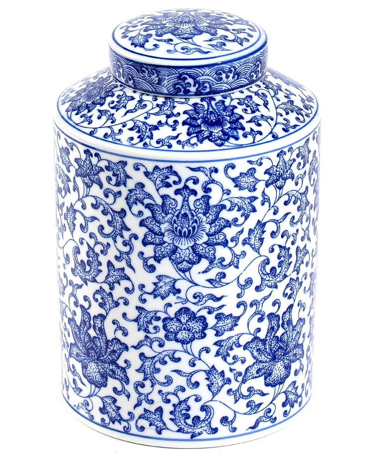 a blue and white vase with an intricate design on it's lid is shown