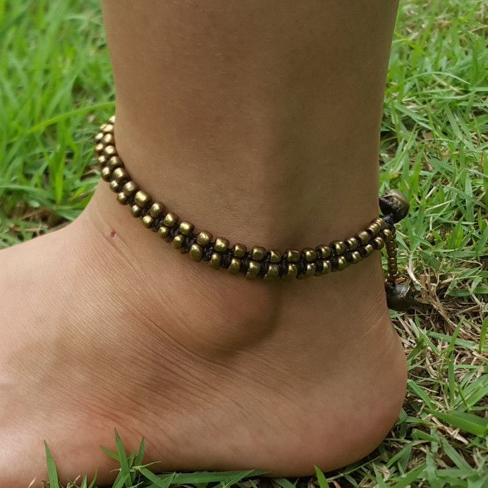 Hand Made Fair Trade Anklet Double Strand Brass Beads Adjustable Metal Traditional Anklets, Traditional Adjustable Metal Anklets, Brass Beaded Bracelets For Festivals, Adjustable Brass Beaded Bracelets With Gold Beads, Festival Brass Beaded Bracelets, Round Beads Brass Bracelets For Festivals, Brass Beaded Bracelet For Festivals, Brass Bracelets With Round Beads For Festivals, Gold Adjustable Hippie Beaded Bracelets